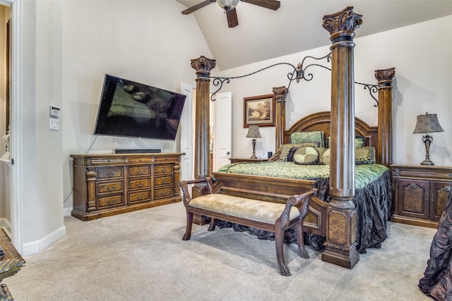 bedroom with lofted ceiling, ceiling fan, and light carpet