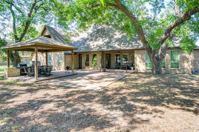 back of property with a patio area