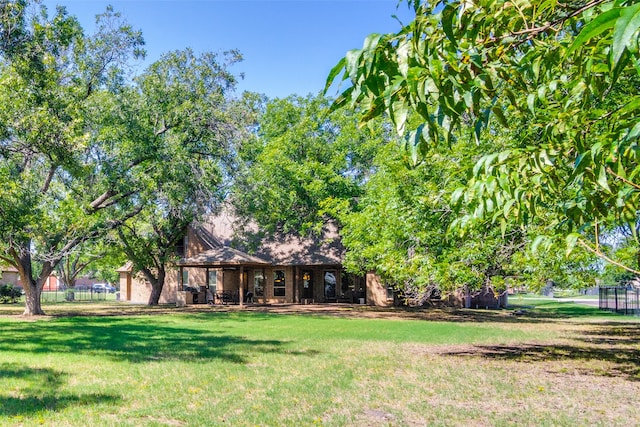 exterior space with a front yard