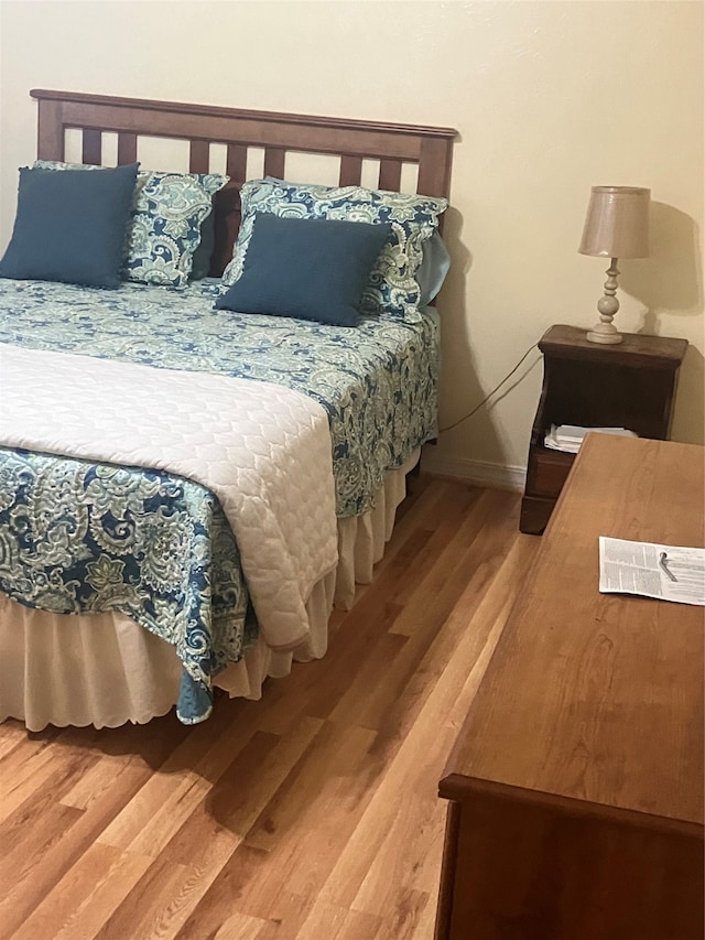 bedroom featuring light wood-type flooring