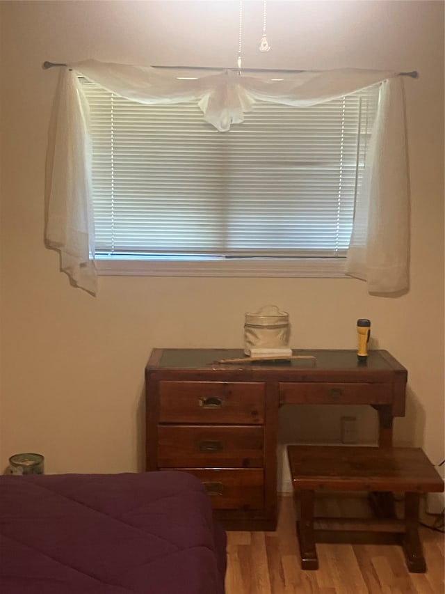 bedroom featuring hardwood / wood-style flooring