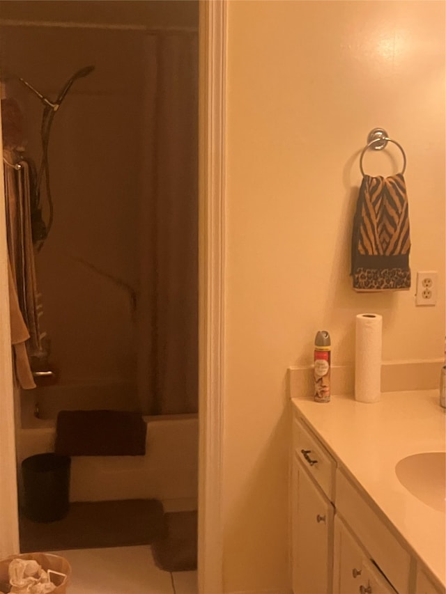 bathroom with vanity and tub / shower combination