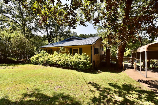 view of yard with a carport