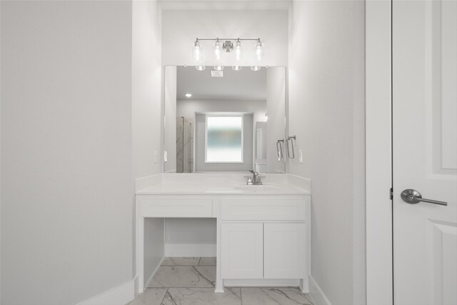 bathroom featuring tile patterned floors and vanity