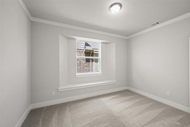 empty room with carpet flooring and ornamental molding