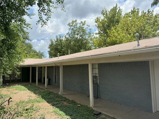 view of home's exterior with a patio area