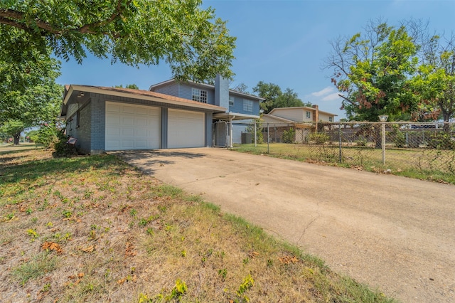 view of front of home featuring a garage