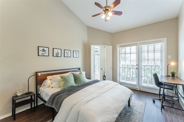 bedroom with ceiling fan, vaulted ceiling, and hardwood / wood-style flooring