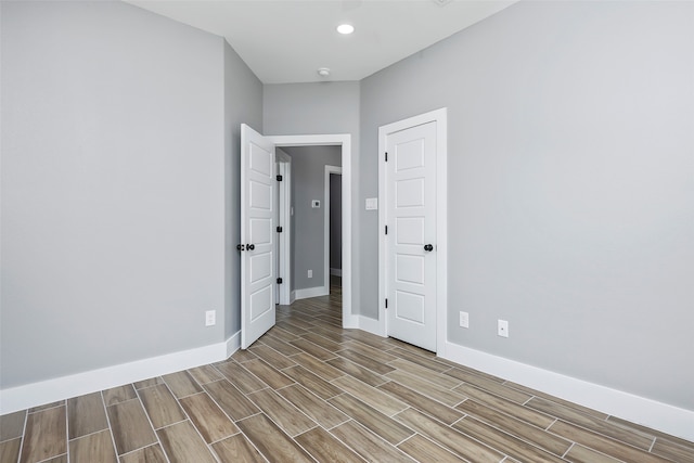 empty room with light hardwood / wood-style flooring