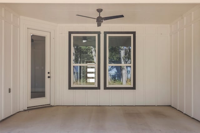 unfurnished room featuring ceiling fan