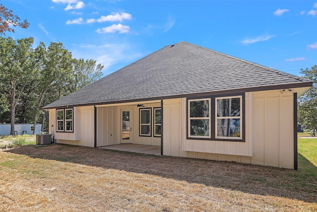 rear view of property featuring a yard, a patio, cooling unit, and ceiling fan