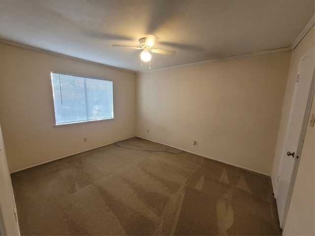 unfurnished room featuring ceiling fan, ornamental molding, and carpet floors