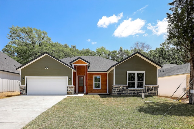 ranch-style home with a garage and a front yard