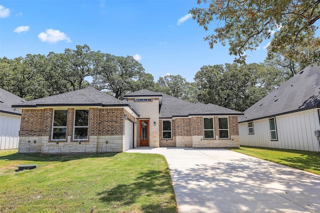 view of front of home with a front yard and a patio