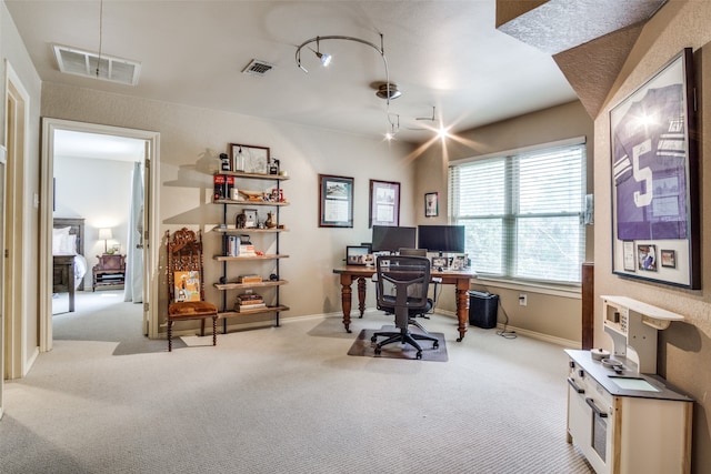 view of carpeted office space