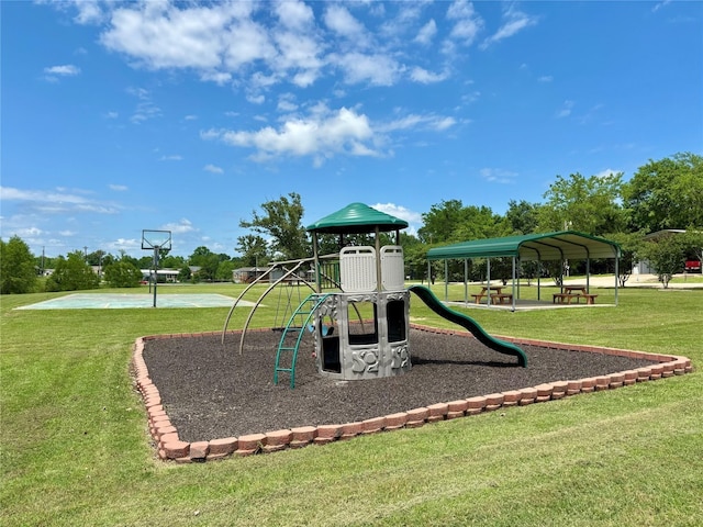 view of play area with a lawn and basketball court