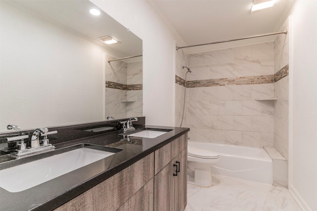 full bathroom with tiled shower / bath combo, toilet, crown molding, and vanity