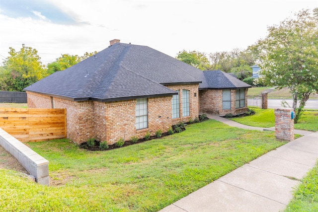 view of home's exterior featuring a yard