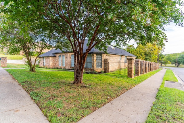 view of front of property with a front lawn