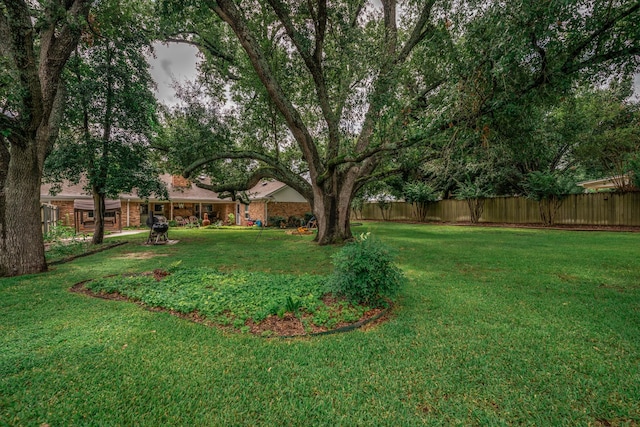 view of yard with fence