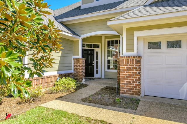 property entrance featuring a garage