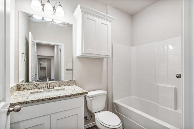 full bathroom featuring vanity,  shower combination, and toilet