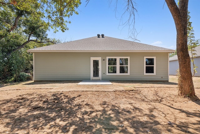 rear view of property featuring a patio