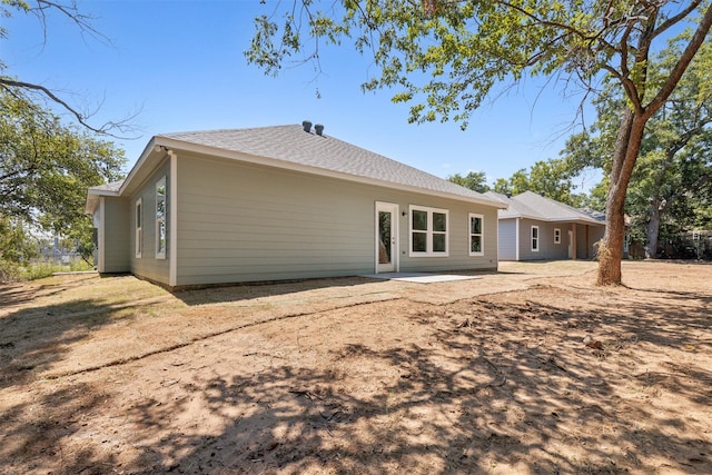 rear view of house with a patio