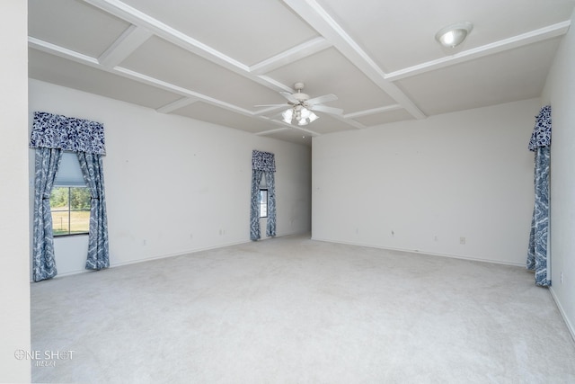 unfurnished room featuring carpet, coffered ceiling, and ceiling fan