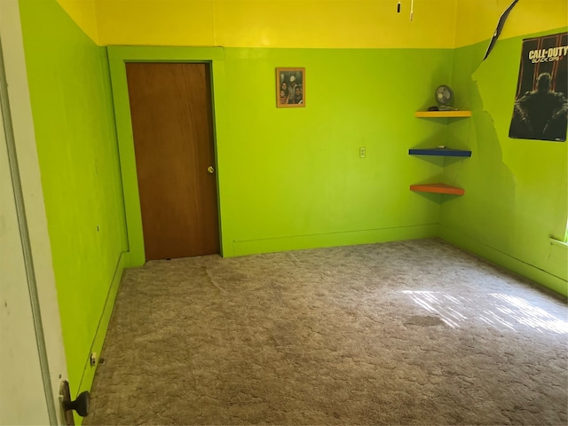 empty room with carpet flooring