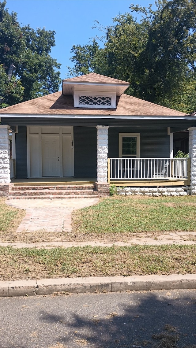 prairie-style home with covered porch