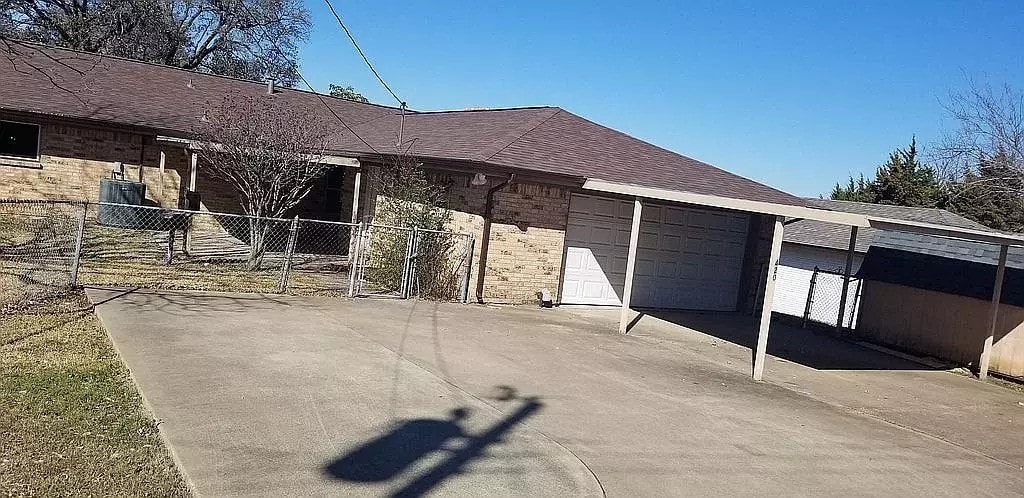 exterior space featuring a garage