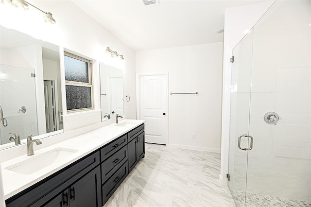 bathroom with vanity and walk in shower