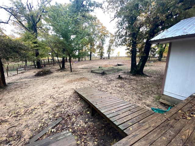 view of yard with a rural view