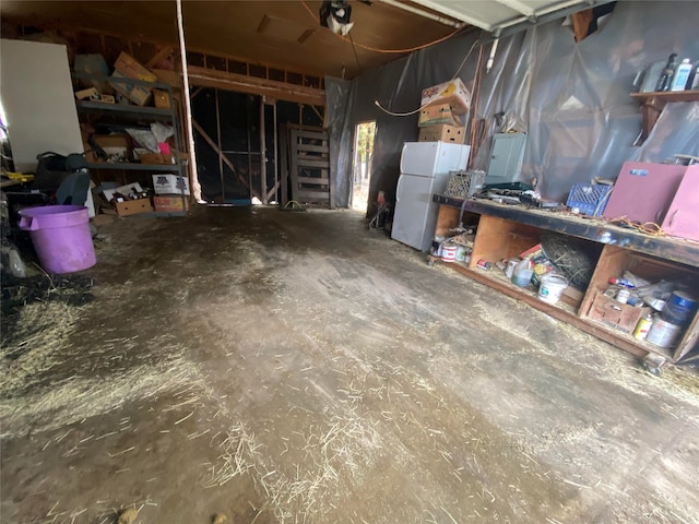 garage featuring white refrigerator