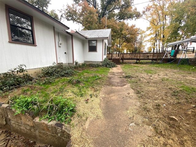 view of yard with a deck