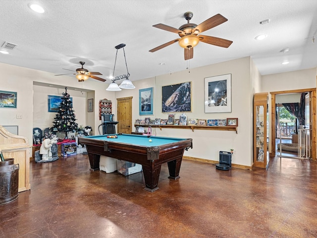 playroom with ceiling fan, a textured ceiling, and pool table