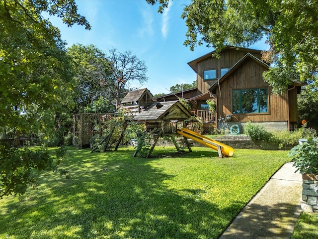 view of yard with a playground