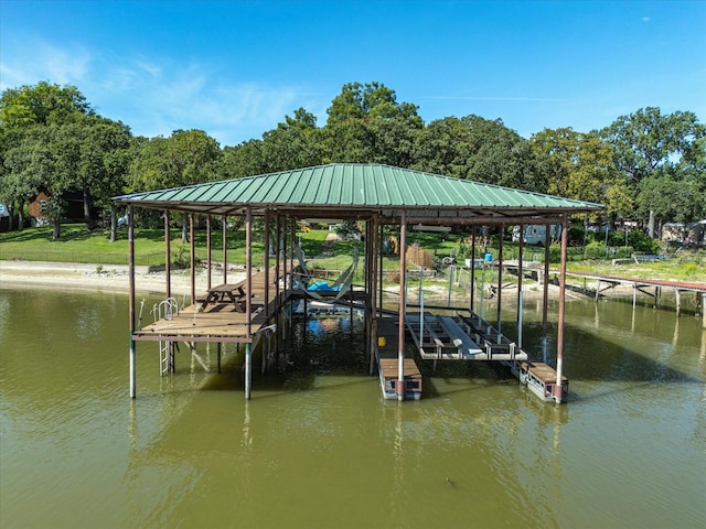 dock area with a water view