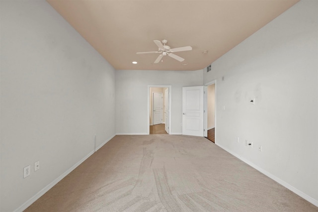 interior space with ceiling fan and carpet floors