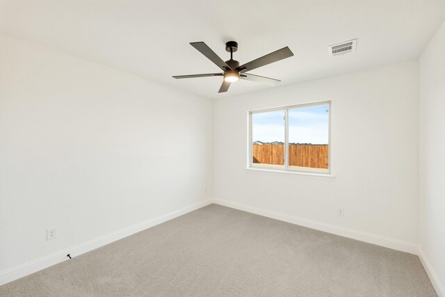 living room featuring ceiling fan and carpet flooring