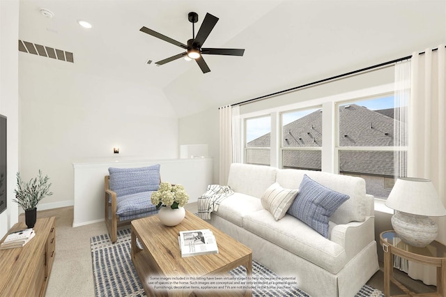 living room featuring carpet, vaulted ceiling, and ceiling fan