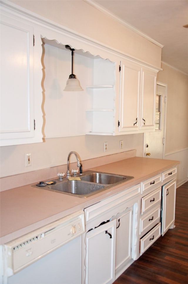 kitchen with white dishwasher, dark hardwood / wood-style flooring, white cabinetry, and sink