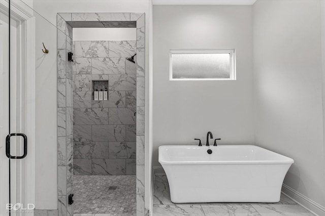 bathroom featuring shower with separate bathtub