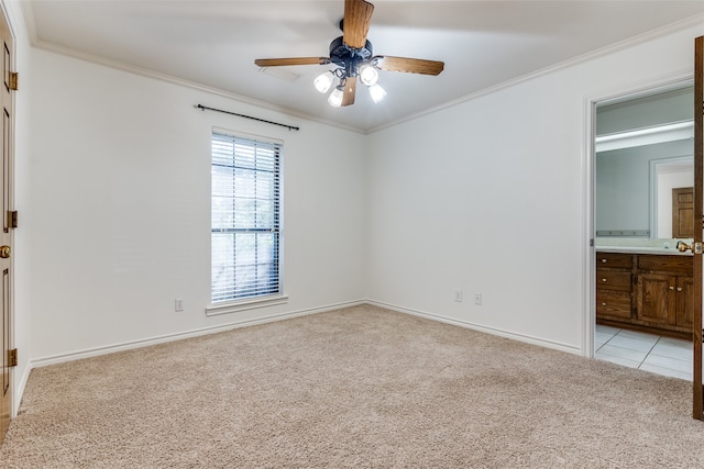 unfurnished bedroom with light colored carpet, ceiling fan, ornamental molding, and ensuite bathroom