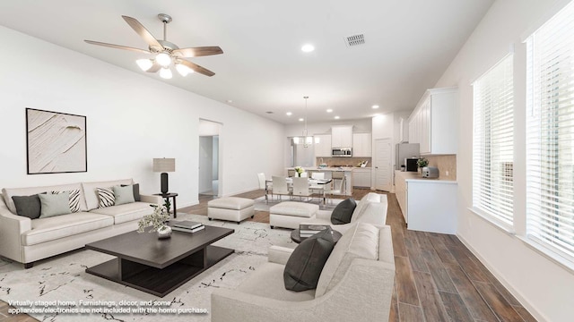 living room with ceiling fan