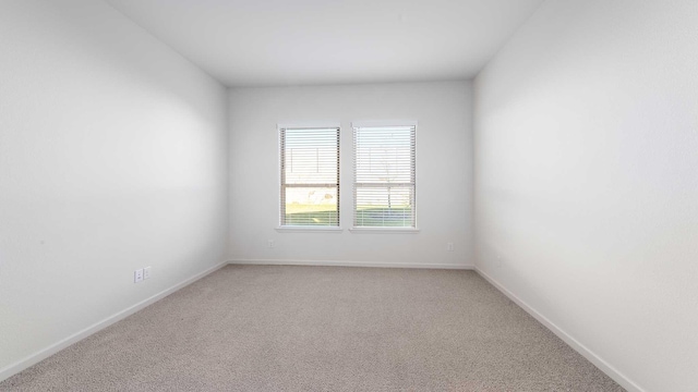 spare room with carpet flooring