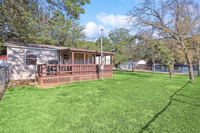 view of yard featuring a deck