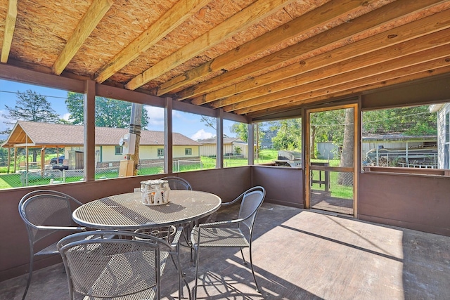 sunroom with lofted ceiling