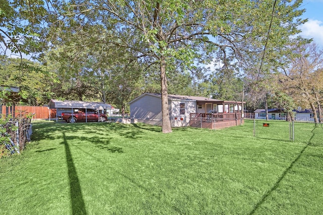 view of yard with a carport